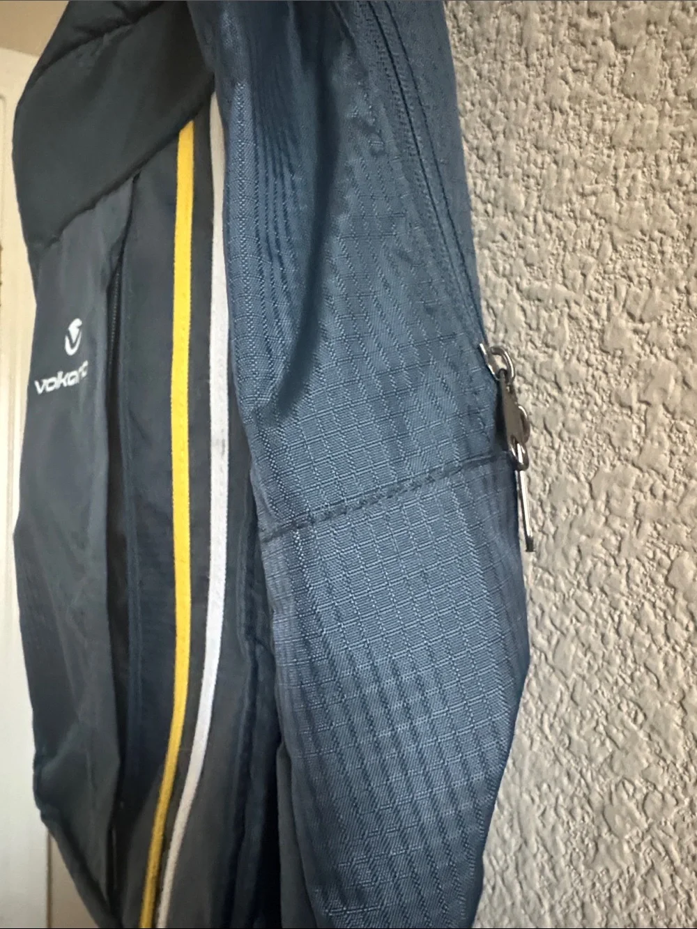 Volkano Track Series Backpack Featuring Vertical Yellow & White Accent Stripes